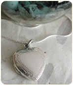 Engraved Sterling Silver Heart Locket With Border